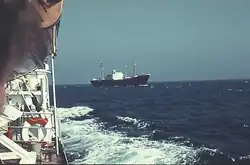 The German cargo ship Helga Howaldt to starboard of Sabine Howaldt (Note the two flags at the top of the ship)