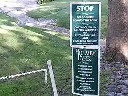 Sign giving instructions about the Armand Hammer Golf Course