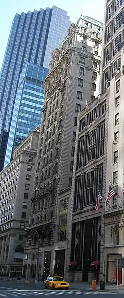 The narrow Fifth Avenue facade of the St. Regis, seen from 54th Street
