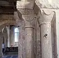 Triple shafts of the Norman arch showing feint original decoration