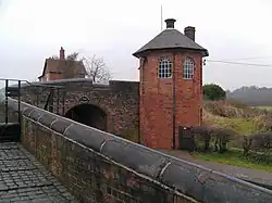 Toll House and upper bridge at the Bratch Locks.