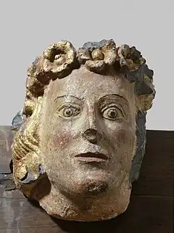 Stone female head