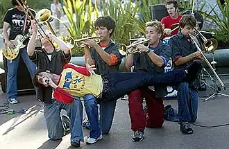 Suburban Legends in 2002. (Left to right: Brian Klemm, Brian Robertson, Vince Walker, Aaron Bertram, Derek Rock, Dallas Cook. Across: Tim Maurer. Not pictured: Chris Maurer.)