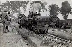 A barrel removed for transport on narrow gauge rails.