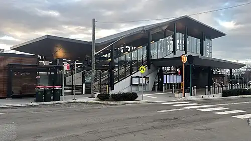 Picture of Sydenham station's new overpass entrance from street level.