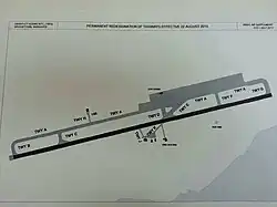 A map showing the runway, taxiways and other structures of the airport.