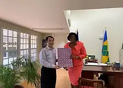 Dougan and Ambassador Ho, 2018.