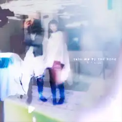 A dreamy and altered photograph of a man and a woman standing in an area.