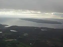 Aerial view from the northeast with a clear view of both The Tickle and Portugal Cove