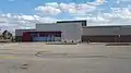 The abandoned Target store at Cloverdale Mall in Etobicoke, Ontario (store #3715) in 2017. This location was replaced with a COVID-19 Vaccine Clinic in 2021. However, it closed down in 2023 due to most people being vaccinated from COVID-19. As of 2025, Fairgrounds Public Racket Club took over the space.