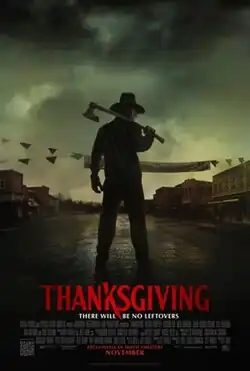 A masked man wearing a pilgrim costume and wielding an axe stands in front of an empty town road. The tagline below the film's title reads. "There will be no leftovers"