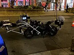 A motorcycle rigged with filming cameras on the set of the film used during filming in the streets of Chicago in 2020.