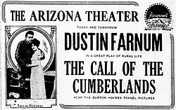 An old newspaper advert with a photo of a man and a woman standing on the left side.