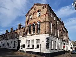 The George Hotel's 19th century sides, rebuilt after a fire, from the High Street