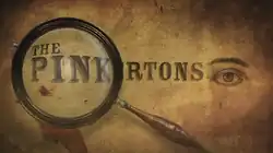 The Pinktertons text with an eye and magnifying glass.