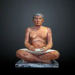 The Seated Scribe; 2613–2494 BC; painted limestone and inlaid quartz; height: 53.7 cm; Louvre
