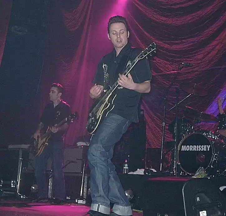 Whyte playing guitar at a Morrissey concert at the Roseland Ballroom in New York City, 2000