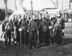 Shogunate soldiers; the soldier in front is wearing a Western-style uniform.