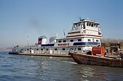 Towboat Michael J. Grainger upbound in Portland Canal on Ohio River, Louisville, Kentucky, USA, 1998