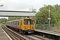 A Merseyrail Class 507 on the West Kirby-bound platform.