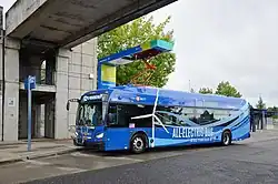 An XE40 being charged by an overhead charger