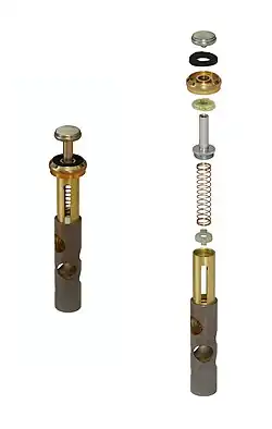 Image 8 Piston valve Photo: Guillaume Piolle The anatomy of a Périnet piston valve, this one taken from a B♭ trumpet. When depressed, the valve diverts the air stream through additional tubing, thus lengthening the instrument and lowering the harmonic series on which the instrument is vibrating (i.e., it lowers the pitch). Trumpets generally use three valves, with some variations, such as a piccolo trumpet, having four. When used singly or in combination, the valves make the instrument fully chromatic, or capable of playing all twelve pitches of classical music. Trumpets may also use rotary valves instead. More selected pictures