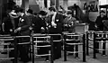 Passengers going through turnstiles on the line c.1934