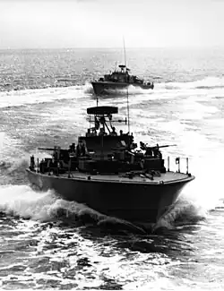 U.S. Navy PTF boats traveling at high speed during trials off the Virginia Capes, United States, early May 1963