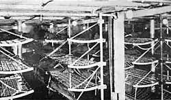 Soldiers' bunk beds in USS&nbsp;Kaiserin Auguste Victoria. The Morse company installed 6,500 such bunks in the ship in 1919.