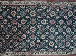 A carpet from Varamin with the Mina Khani motif
