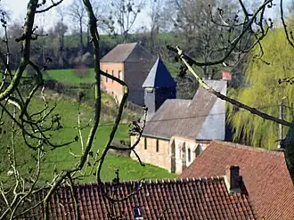 South face of the church, with the town hall behind