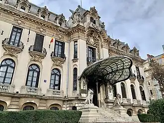 View of the palace, with its pair of Louis XIV style lions at the entrance