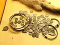 6 Islamic, 15 English, and 76 German coins, latest coin dates from 1006 to 1030 - National Museum of Finland