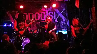 Voodoo Six performing at The Cluny, Newcastle upon Tyne in 2014