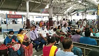 Waiting Travelers at Howrah Railway Station
