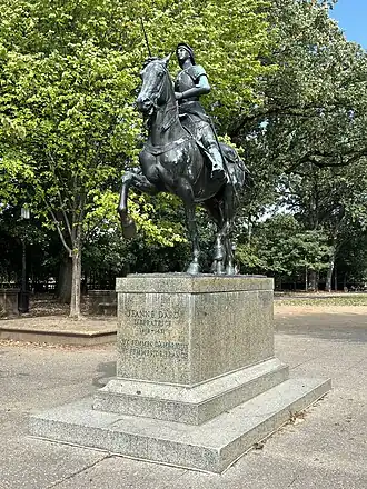 Equestrian sculpture of a woman wielding a sword