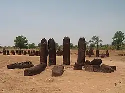 Image 2The Senegambian stone circles (Wassu section) believed by archaeologists and historians to be built by the Serer people of the Senegambia region. The Senegambia stone circles are the largest concentration of stone circles seen anywhere in the world according to UNESCO. They are sacred burial grounds and a place of ritual offerings (kuur in Serer). Credit: Atamari For more about this picture, see Senegambian stone circles, Mummification and Cult of the Upright Stones in Serer religion, and Serer ancient history.