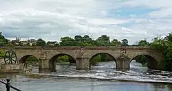 The west side of Wetherby Bridge showing the weir