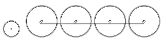 Diagram of one small leading wheel, and four large driving wheels joined by a coupling rod