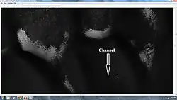 Close-up of defrosting dunes, as seen by HiRISE under HiWish program. Some ripples and a small channel are also visible.