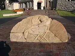 Sculpture in front of the memorial