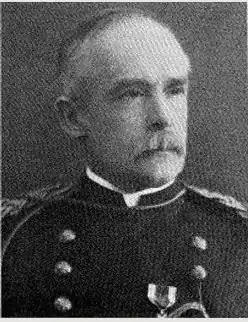 Black and white head and shoulders photo of Brigadier General William Ennis in dress uniform, looking slightly left