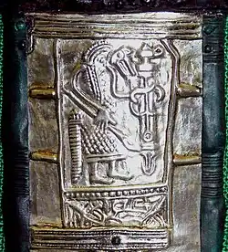 A wolf headed warrior on the Gutenstein scabbard&nbsp;[de].