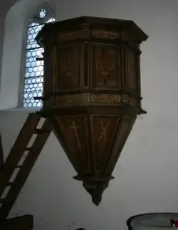 Wooden pulpit in the Old Church, Macugnaga, Italy.png