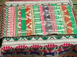 Dai woven textile, weaving collection, Yunnan Nationalities Museum, Kunming, Yunnan, China.