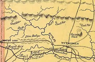 Old map showing railroad line and two communities