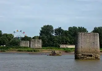 The pillar stubs of the Yalu River Broken Bridge between Dandong and Sinuiju, which was established in 1911 and destroyed during the Korean War (direction of photo looking south into North Korea).