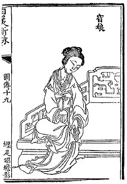 A black and white stylised illustration of a seated woman, one foot resting on top of her left thigh, wrapping and binding her right foot.