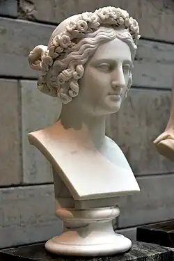 Young woman with flowers wreath in her hair, by Johan Niklas Byström. Marble. Nationalmuseum, Stockholm, Sweden