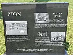 A marker in Zion, at the site of the former school